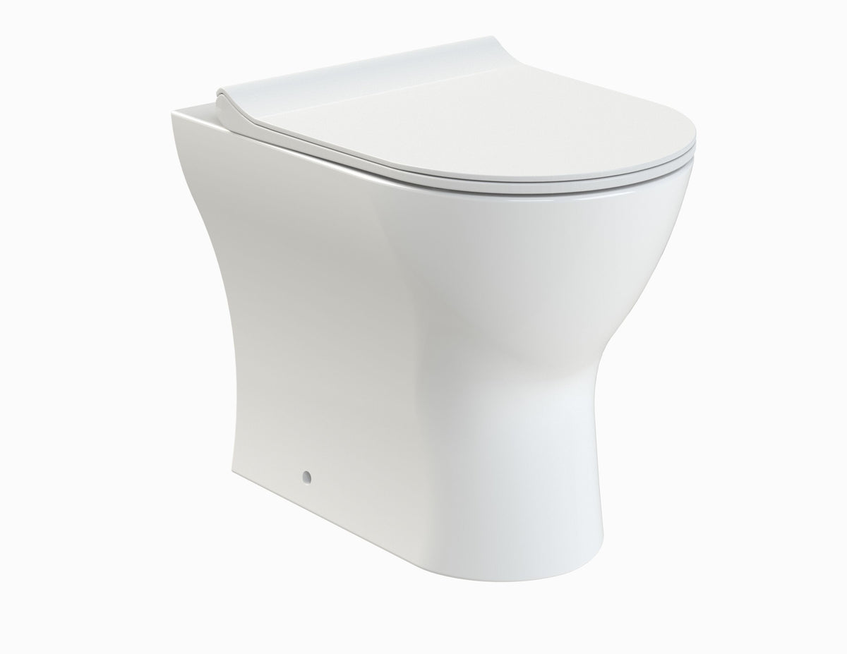nuie Freya Round Back to Wall Toilet Pan With Seat - Main product image
