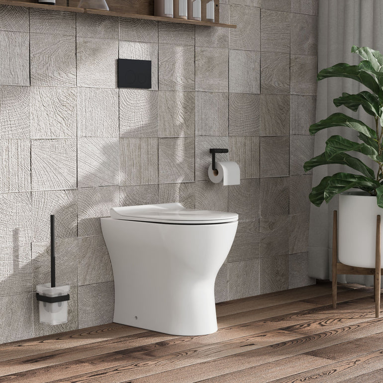 nuie Freya Round Back to Wall Toilet Pan With Seat - Lifestyle image