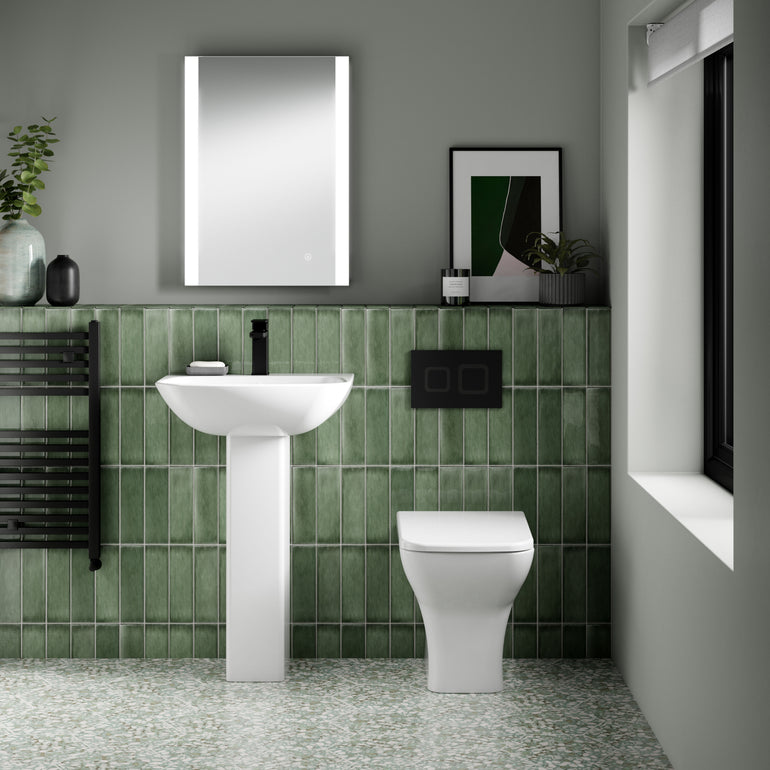 nuie Ava Round Back to Wall Toilet Pan With Seat - Lifestyle image
